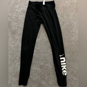 Black small Nike leggings with Nike symbol on the side. Brand new - never worn!